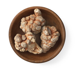 Dried notoginseng in the wooden bowl,  isolated on white background, top view