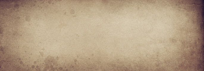 Old vintage beige paper background in spots