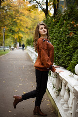 autumn photo session of the girl. autumn landscape. portrait in autumn. woman in the frame. 