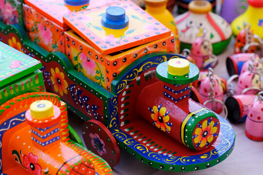 Traditional handmade Colorful toys made from wood, wooden toys, family, selective focus.