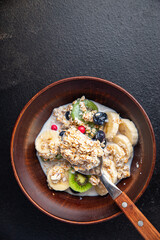 oatmeal berries oat flakes breakfast porridge healthy meal food diet snack on the table copy space food background rustic. top view keto or paleo diet veggie vegan or vegetarian food