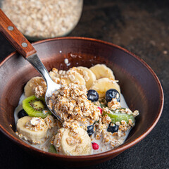 oatmeal berries oat flakes breakfast porridge healthy meal food diet snack on the table copy space food background rustic. top view keto or paleo diet veggie vegan or vegetarian food