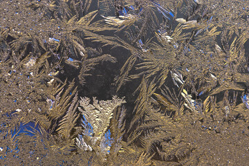 Snowflake on dark fabric background