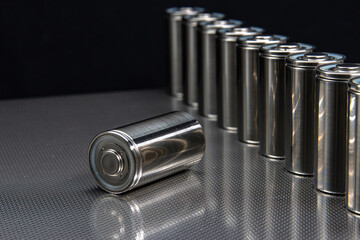 A consignment of new modern high-capacity lithium-ion cells. A prototype of new batteries on a laboratory steel table.