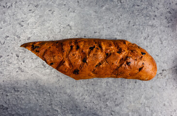 loaf of bread baguette with seeds and raisins