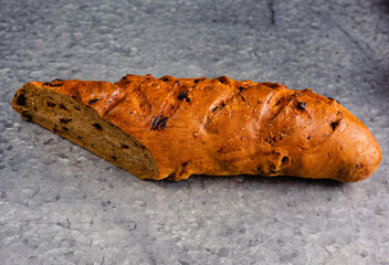 loaf of bread baguette with seeds and raisins