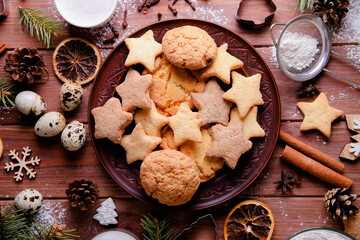 Ingredients for Christmas cookies on wooden background
