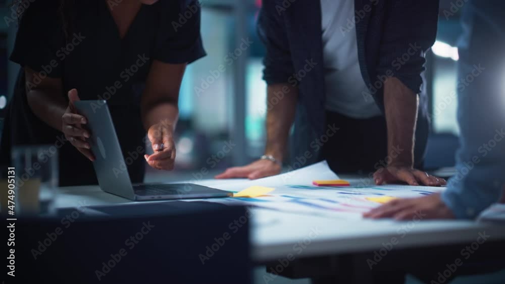 Poster office conference room meeting in close up: focusing on hands on table: diverse team of top managers