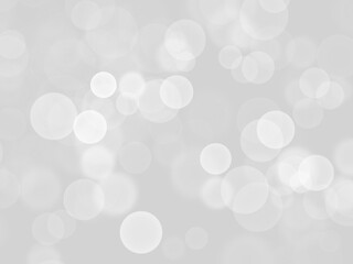 薄いグレーに丸いキラキラの背景