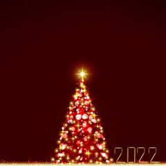 New Year 2022 background with blur bokeh and Christmas tree.