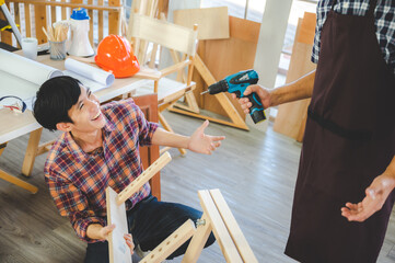 wooden workshop concept, carpenter team craftsman person working with a wood work construction tool
