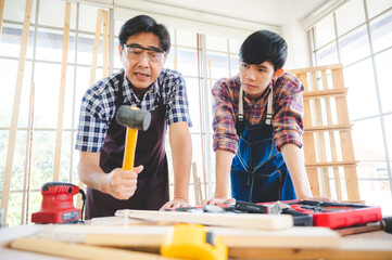 wooden workshop concept, carpenter team craftsman person working with a wood work construction tool