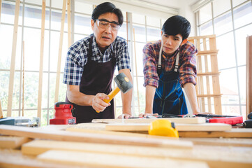 wooden workshop concept, carpenter team craftsman person working with a wood work construction tool