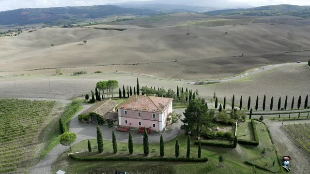 Aerial view, Flifgt at estate with cypress trees, Val d'Orcia; Montalcino, Siena Region, Tuscany, Italy