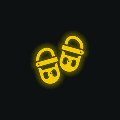 Baby Shoes yellow glowing neon icon