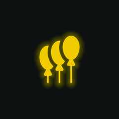 Balloons yellow glowing neon icon