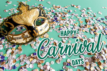 Carnival concept on green confetti background, Brazilian carnival mask.