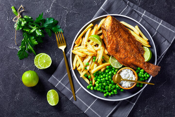 fried redfish with chips, green peas, tartar sauce