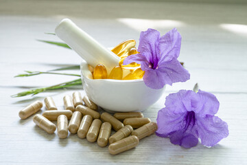 Alternative medicine herbal organic capsule with vitamin E omega 3 fish oil, mineral, drug with herbs leaf natural supplements for healthy good life.