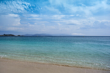Fototapeta na wymiar Clear water and white sand beach in Cies Islands
