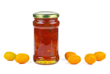 Cumquat or kumquat jam in glass jare and fresh berries isolated on white background