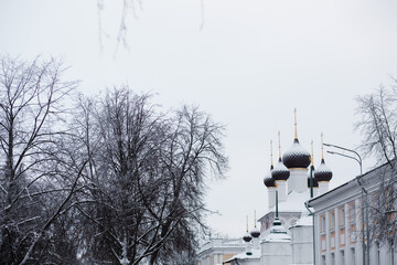Domes of the Orthodox Church with snow.