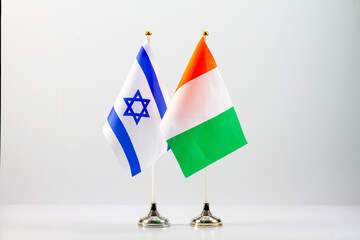 State flags of Israel and Cote d'Ivoire on a light background. Flags of states.
