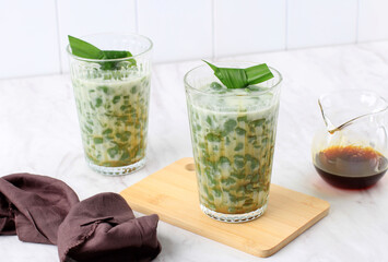 Lod Chong or Cendol is an Iced Sweet Dessert, contains droplets of green rice flour jelly, coconut...
