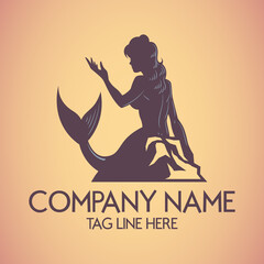 Silhouette logo of mermaid sitting on the reef