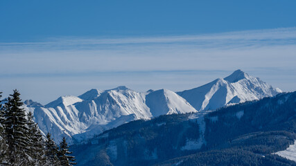beautiful view of the snow capped hohe tauern in austria at a sunny  winter day
