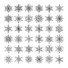 Naklejka na ściany i meble Collection of monochrome illustrations of snowflakes in sketch style. Hand drawings in art ink style. Black and white graphics.