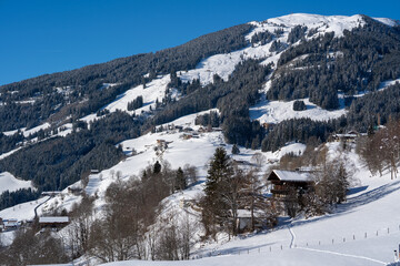 beautiful view of the snow capped hohe tauern in austria at a sunny  winter day