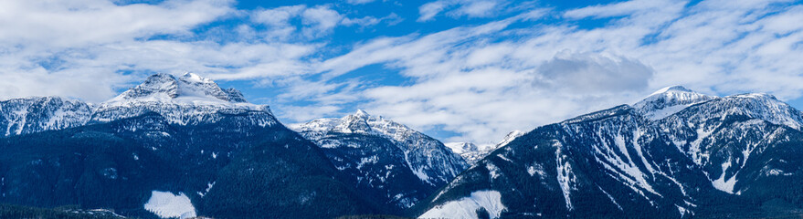 Fototapeta na wymiar panorama of huge mountains covered by snow british columbia canada