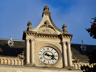 Historic clock on top of Cercle Cite building in Luxembourg