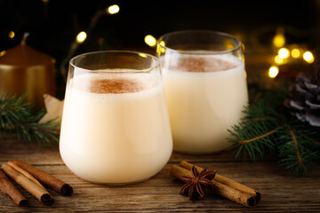 Eggnog - egg and cinnamon milk cocktail for Christmas and winter holidays.
