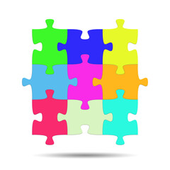 Fototapeta premium Bunte Puzzleteile vor weißem Hintergrund