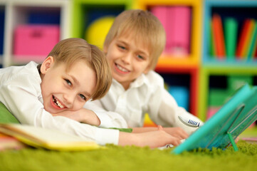 Fototapeta na wymiar portrait of a cute two boys doing homework