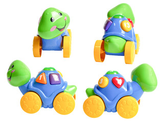 turtle shape in wheel car baby toy on isolated white background