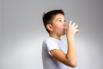 child drinks pure water