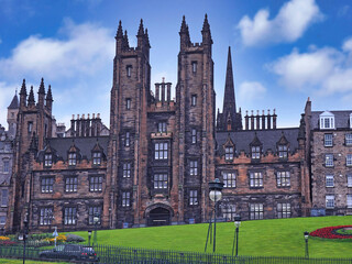 Fototapeta na wymiar Front view of New College of the University of Edinburgh, looking up Castle Hill