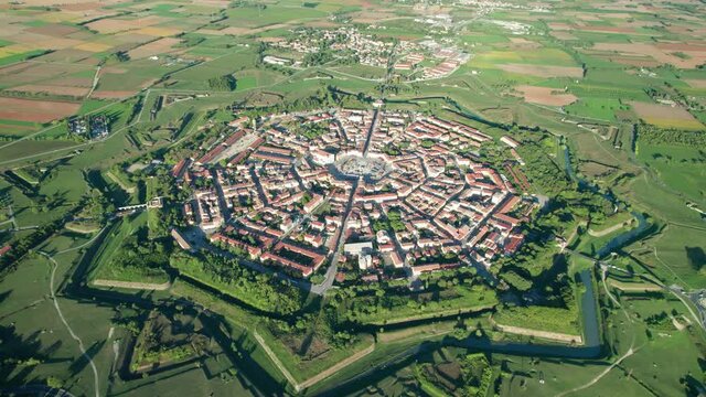 Town of Palmanova defense walls and trenches aerial view, UNESCO world heritage site in Friuli Venezia Giulia region of Italy