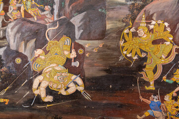 Fragment of a fresco with scene from the Ramakien at Wat Phra Kaew or Emerald Buddha Temple a tourist landmark in Bangkok, Thailand. These images are the public domain and a treasure of Buddhism, no r