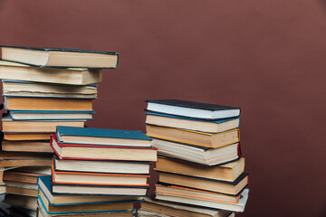 Stacks of Books for College Library Training Brown Background