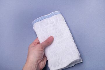 Delicate cotton white medical panties after childbirth. Products for pregnant women.