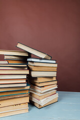 Stacks of Books for College Library Training Brown Background