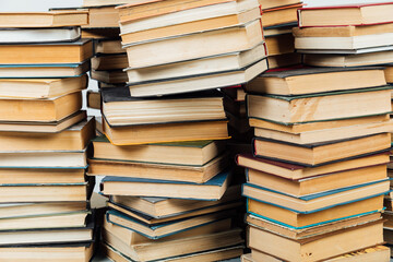 Stacks of books for teaching knowledge of the college school library white background