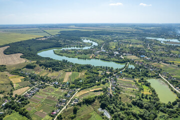 Fototapeta na wymiar Aerial view of town with river and nature