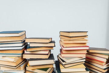 Stacks of books for teaching knowledge of the college university library white background