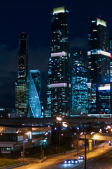 night city skyscrapers business center traffic transport lights urban vibe