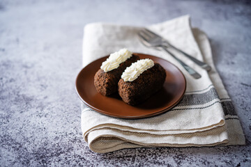 Chocolate cake potato in a plate